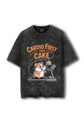 Manmaker black t-shirt with a graphic of a hamster on a treadmill and text 'Cardio First Then Cake' on a white background.