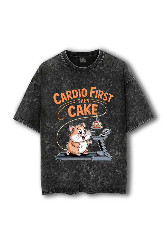 Manmaker black t-shirt with a graphic of a hamster on a treadmill and text 'Cardio First Then Cake' on a white background.